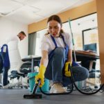 professional-cleaning-service-person-using-vacuum-cleaner-office_23-2150520594