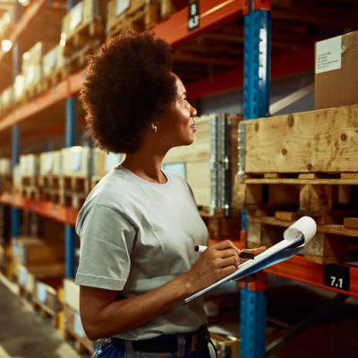 african-american-worker-writing-inventory-list-while-checking-stock-storage-room-min african-american-worker-writing-inventory-list-while-checking-stock-storage-room-min
