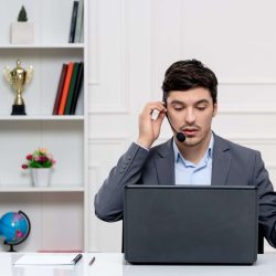 customer-service-handsome-man-grey-suit-with-computer-headset-talking-computer customer-service-handsome-man-grey-suit-with-computer-headset-talking-computer